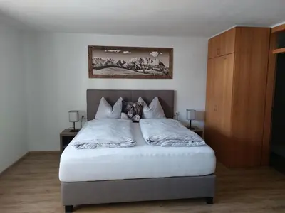 Ein Bett oder Betten in einem Zimmer der Unterkunft Apartment Rainer - mittendrin
