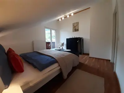Ein Bett oder Betten in einem Zimmer der Unterkunft Haus Putzas Appartment