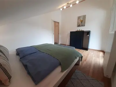 Ein Bett oder Betten in einem Zimmer der Unterkunft Haus Putzas Appartment