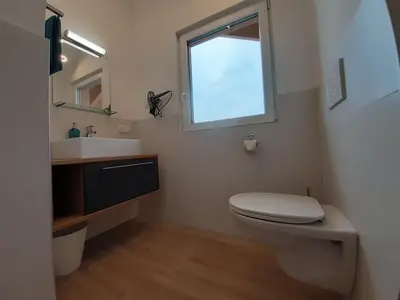 Ein Badezimmer in der Unterkunft Haus Putzas Appartment