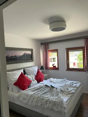 Ein Bett oder Betten in einem Zimmer der Unterkunft Residence Cosy