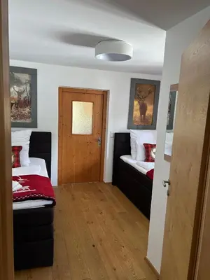Ein Bett oder Betten in einem Zimmer der Unterkunft Residence Cosy