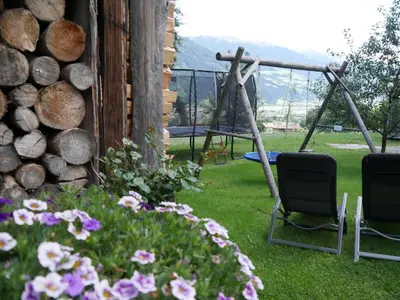 Ein Garten an der Unterkunft Riemenerhof