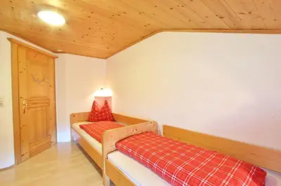 Ein Bett oder Betten in einem Zimmer der Unterkunft Ferienwohnung Örgenhof