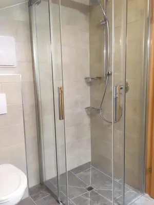 Ein Badezimmer in der Unterkunft Ski in out! Gemütliche Dachgeschosswohnung