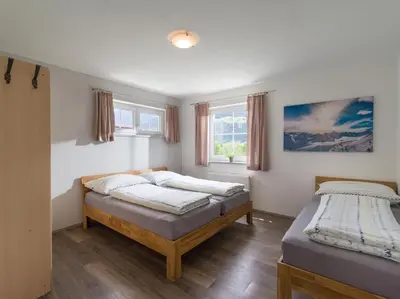 Ein Bett oder Betten in einem Zimmer der Unterkunft ZillertalAppartements Günter