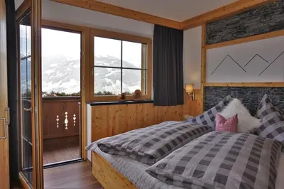 Ein Bett oder Betten in einem Zimmer der Unterkunft Apartment Alpenstyle by Katharina