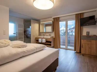 Ein Bett oder Betten in einem Zimmer der Unterkunft Haus Kathi