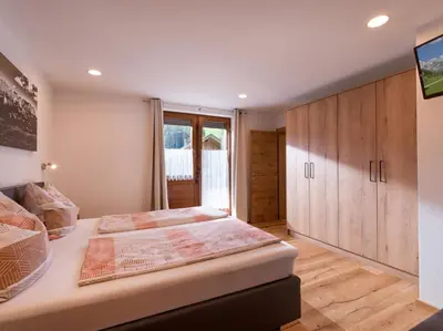Ein Bett oder Betten in einem Zimmer der Unterkunft Haus Salvenmoser