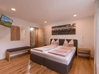 Ein Bett oder Betten in einem Zimmer der Unterkunft Haus Salvenmoser