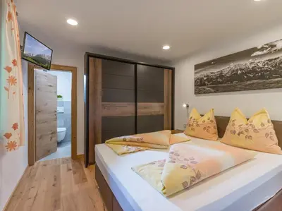 Ein Bett oder Betten in einem Zimmer der Unterkunft Haus Salvenmoser
