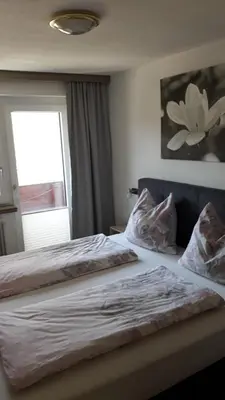 Ein Bett oder Betten in einem Zimmer der Unterkunft Haus Salvenmoser