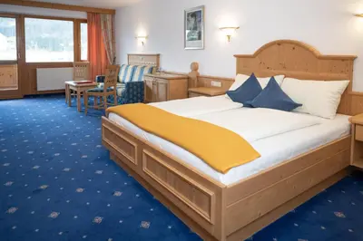 Ein Bett oder Betten in einem Zimmer der Unterkunft Hotel Waidachhof