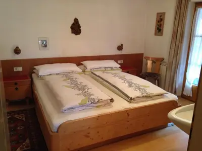 Ein Bett oder Betten in einem Zimmer der Unterkunft Bichlhof