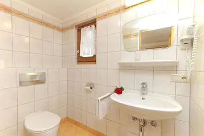 Ein Badezimmer in der Unterkunft Hotel Mitterer