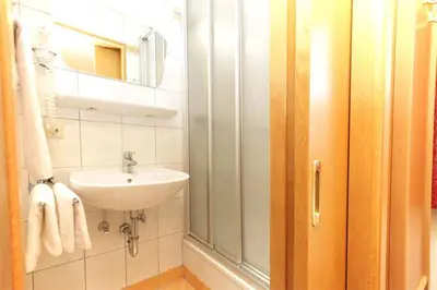 Ein Badezimmer in der Unterkunft Hotel Mitterer