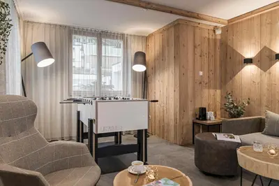 Ein Sitzbereich in der Unterkunft Alpin Apartments