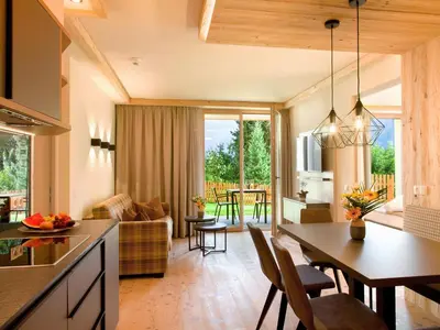 Ein Sitzbereich in der Unterkunft Alpin Apartments