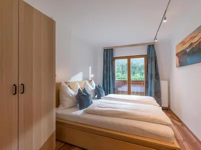 Ein Bett oder Betten in einem Zimmer der Unterkunft Ferienhaus am Erlachhof
