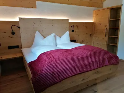 Ein Bett oder Betten in einem Zimmer der Unterkunft Apart Auszeit