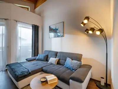 Ein Sitzbereich in der Unterkunft Ferienwohnung Eisenmann