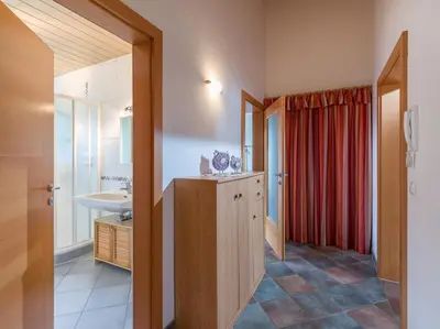Ein Bett oder Betten in einem Zimmer der Unterkunft Ferienwohnung Eisenmann