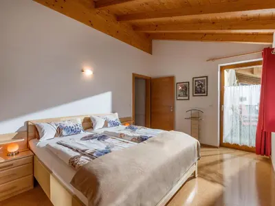 Ein Bett oder Betten in einem Zimmer der Unterkunft Ferienwohnung Eisenmann