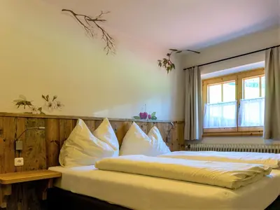 Ein Bett oder Betten in einem Zimmer der Unterkunft Alpengasthof Hochsöll