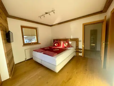 Ein Bett oder Betten in einem Zimmer der Unterkunft Ferienhaus Hildegard