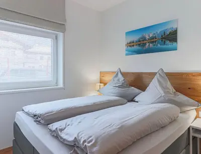 Ein Bett oder Betten in einem Zimmer der Unterkunft Appartement Almblick