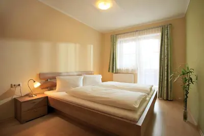 Ein Bett oder Betten in einem Zimmer der Unterkunft Landhaus Aschaber