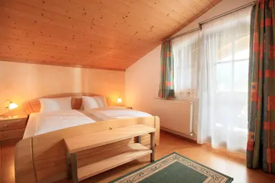 Ein Bett oder Betten in einem Zimmer der Unterkunft Landhaus Aschaber