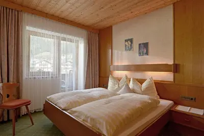 Ein Bett oder Betten in einem Zimmer der Unterkunft Ferienwohnungen Johanna