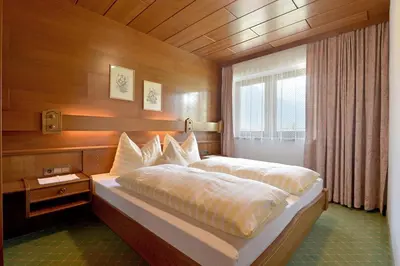 Ein Bett oder Betten in einem Zimmer der Unterkunft Ferienwohnungen Johanna