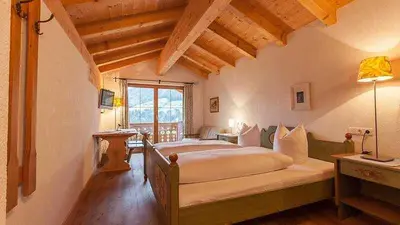Ein Bett oder Betten in einem Zimmer der Unterkunft Chalet Enthofer