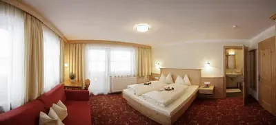 Ein Bett oder Betten in einem Zimmer der Unterkunft Landhaus Tirol