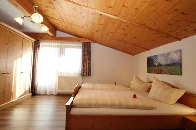 Ein Bett oder Betten in einem Zimmer der Unterkunft Obermooshof