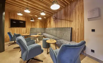 Ein Sitzbereich in der Unterkunft Hotel Gungau