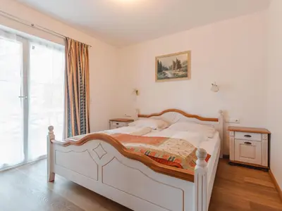 Ein Bett oder Betten in einem Zimmer der Unterkunft Chalet Hochkrimml 2 by Interhome