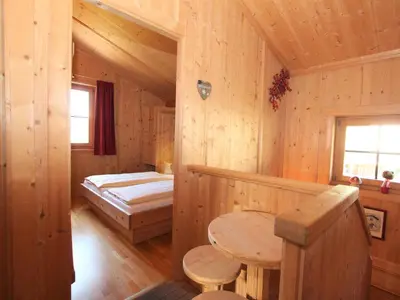 Ein Bett oder Betten in einem Zimmer der Unterkunft Holiday Home Schwendau-2 by Interhome