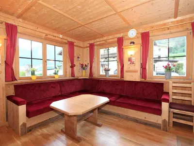 Ein Sitzbereich in der Unterkunft Holiday Home Schwendau-3 by Interhome