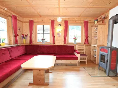 Ein Sitzbereich in der Unterkunft Holiday Home Schwendau-3 by Interhome