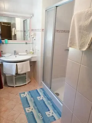 Ein Badezimmer in der Unterkunft St. Christoph