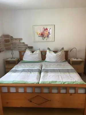 Ein Bett oder Betten in einem Zimmer der Unterkunft Wörter Marianne