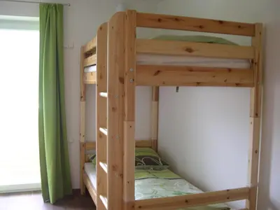 Ein Bett oder Betten in einem Zimmer der Unterkunft Ferienwohnung Fritz 2 Obergeschoss