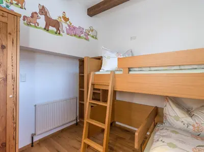 Ein Bett oder Betten in einem Zimmer der Unterkunft Stöcklalm