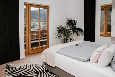 Ein Bett oder Betten in einem Zimmer der Unterkunft Residenz am Berg