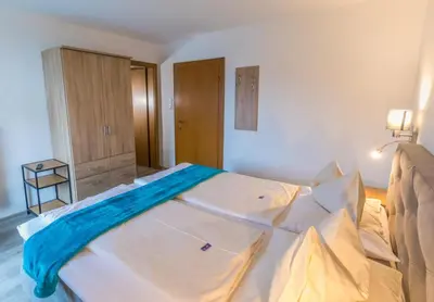 Ein Bett oder Betten in einem Zimmer der Unterkunft Haus Landmann