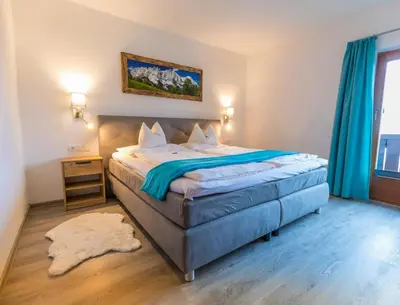 Ein Bett oder Betten in einem Zimmer der Unterkunft Haus Landmann