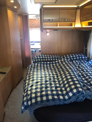 Ein Bett oder Betten in einem Zimmer der Unterkunft Zillerglückhütte - 5 Sterne Camping Aufenfeld